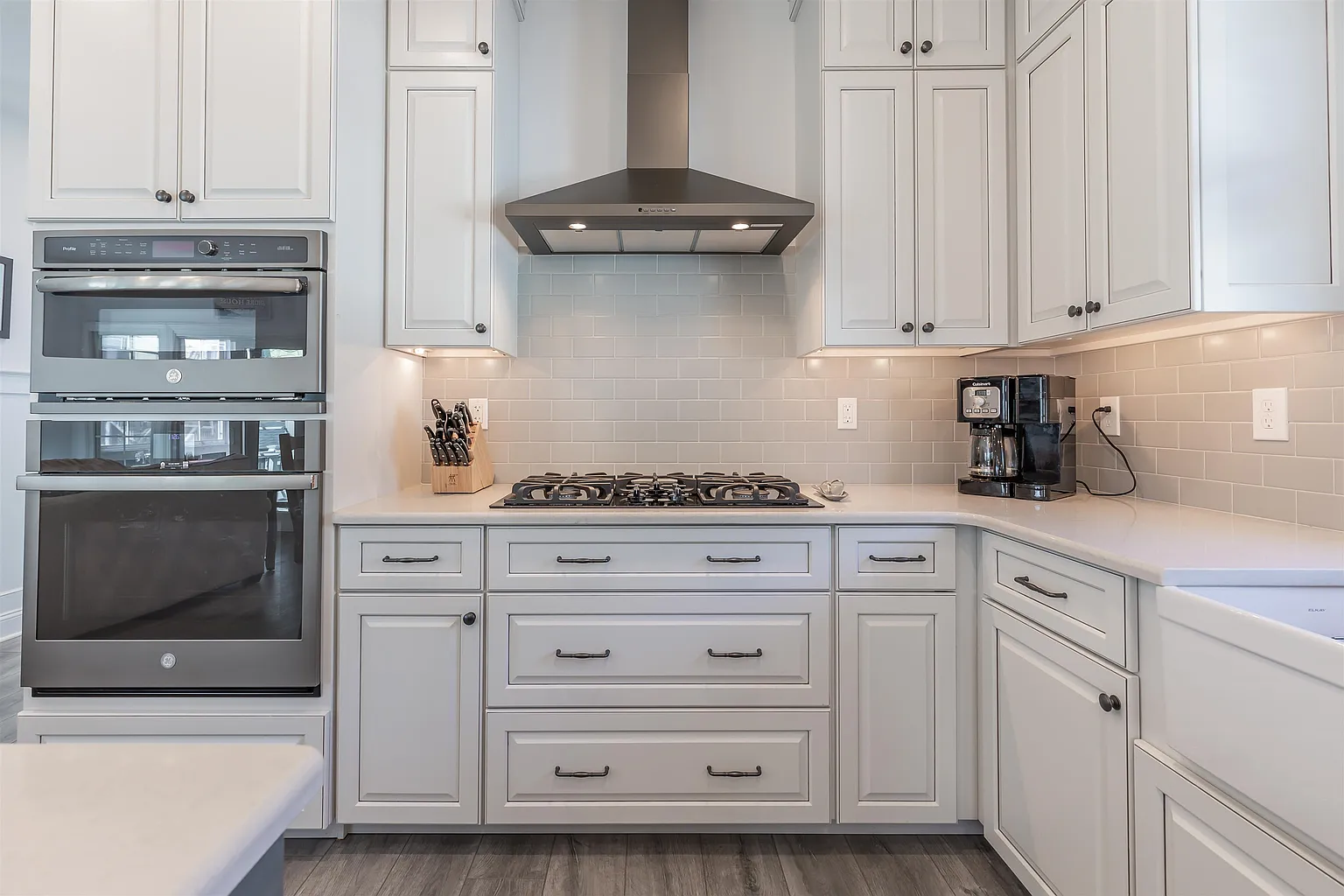 Modern kitchen with gas stove and oven.