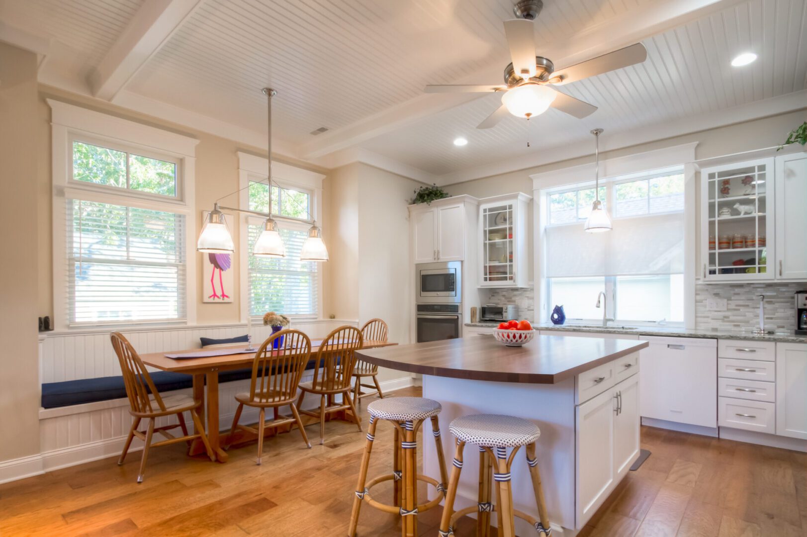 Bright kitchen with island and breakfast nook.