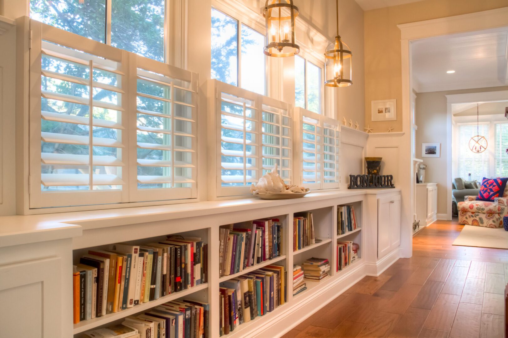 Built-in window seat with bookshelves.