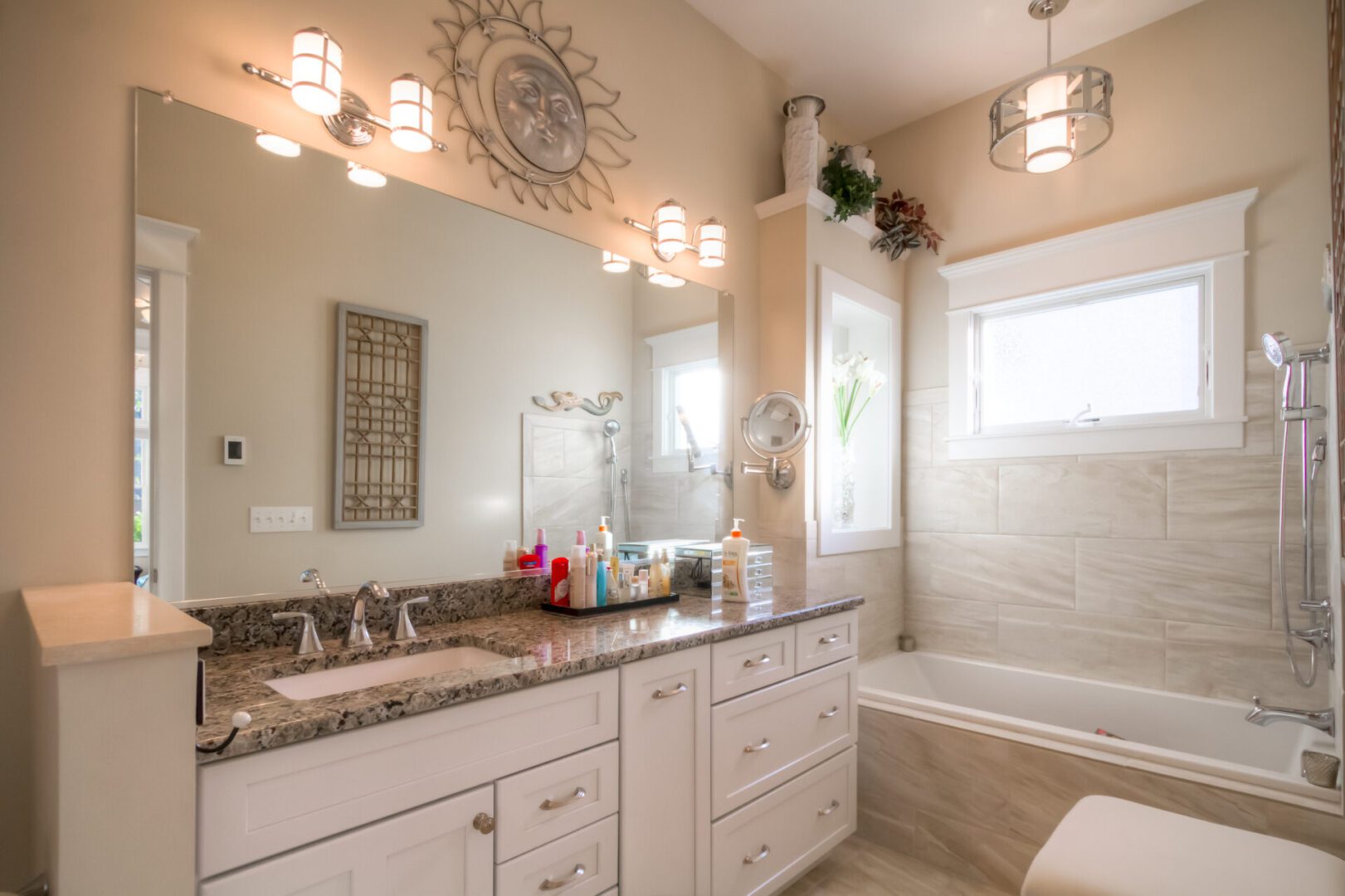 Elegant bathroom with granite countertop.