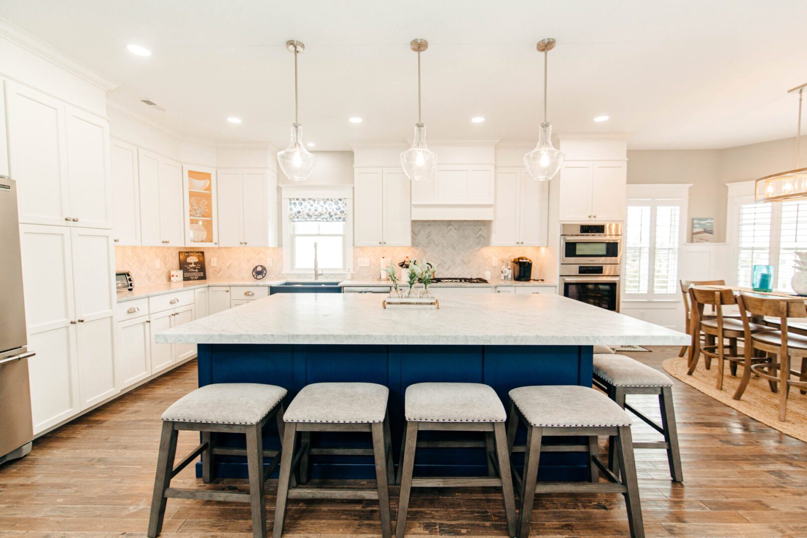 White kitchen island with blue base.