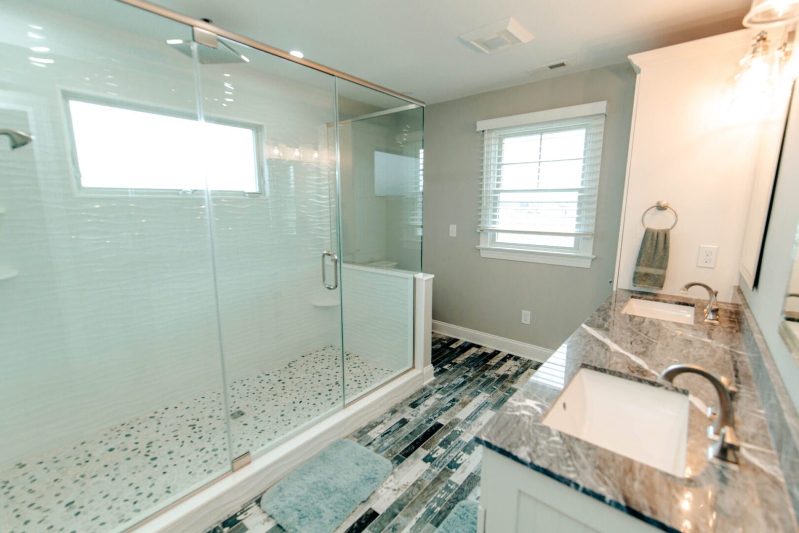 Modern bathroom with walk-in shower.