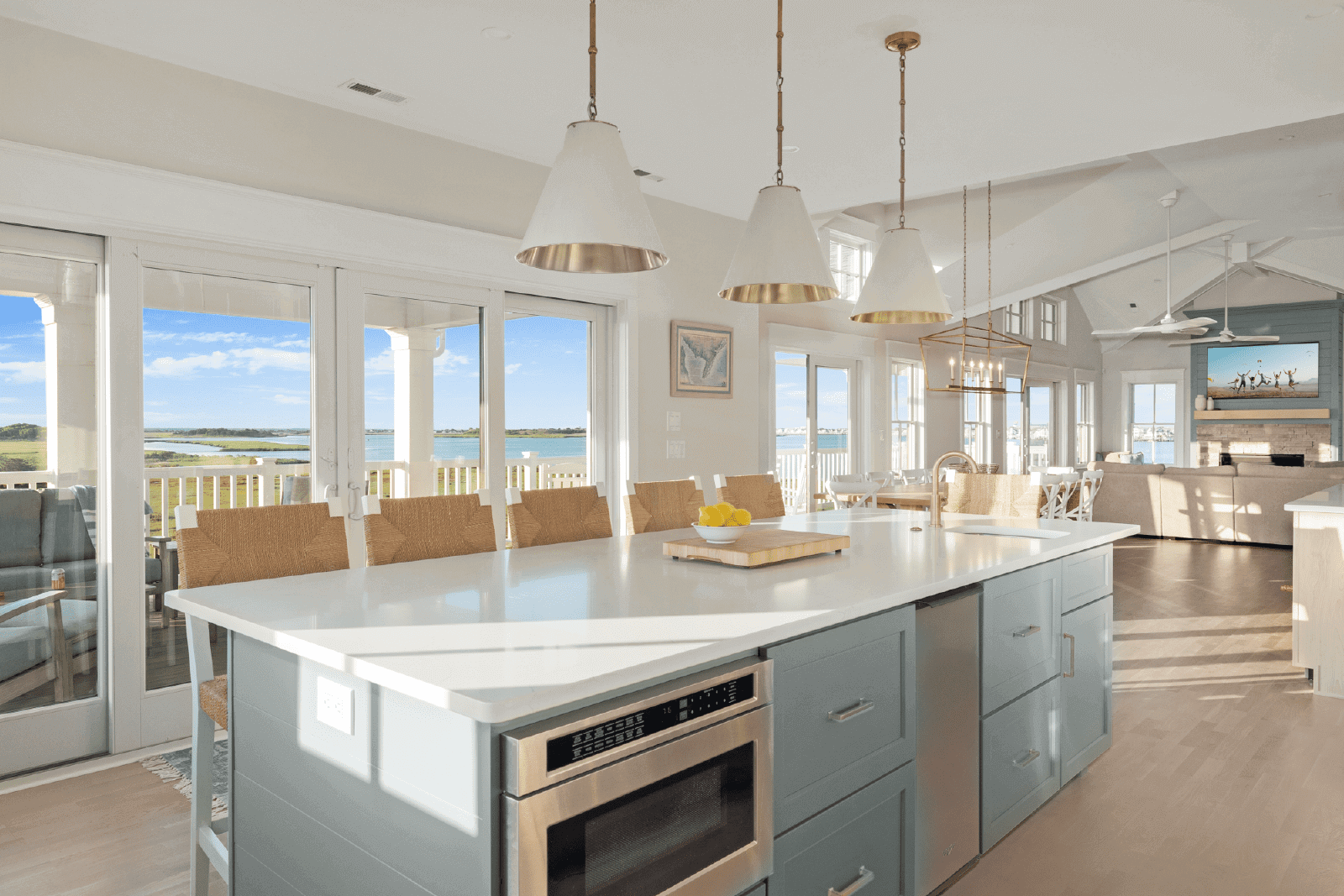 Modern kitchen island with water view.