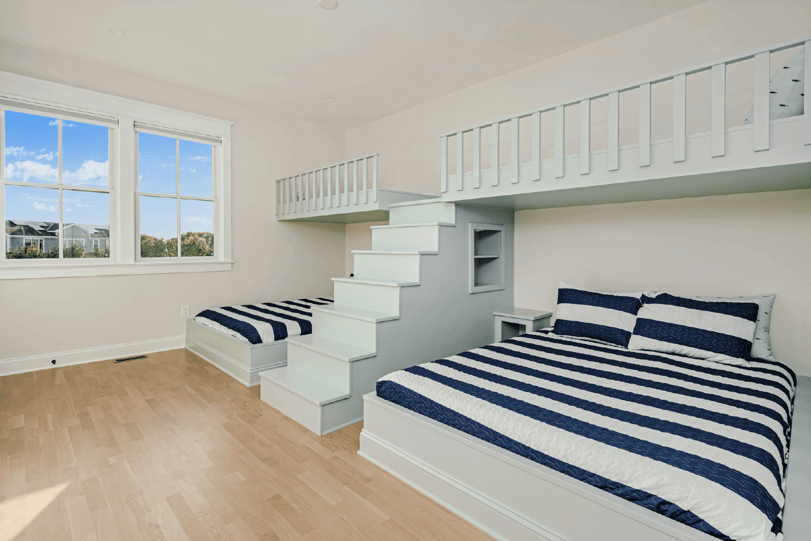 Children's bedroom with built-in bunk beds.