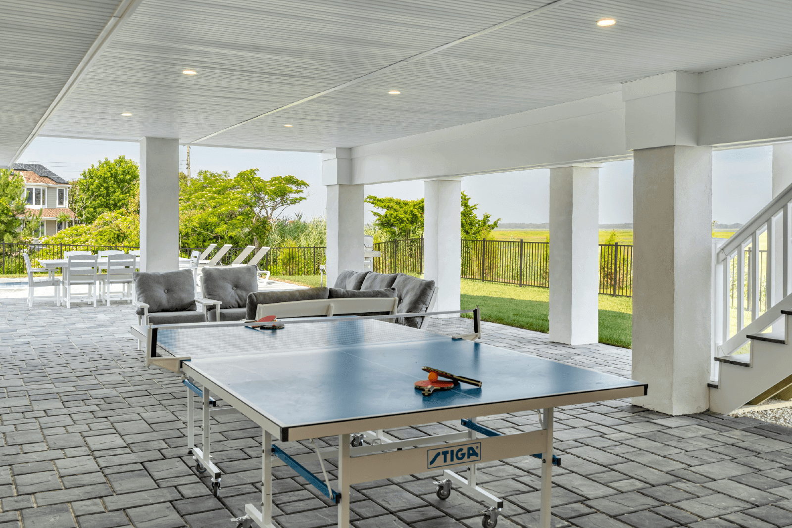 Outdoor ping pong table, patio furniture.